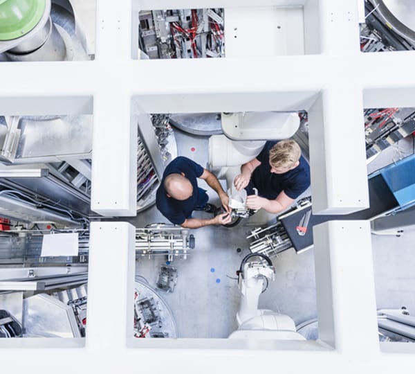 aerial view of 2 people working together